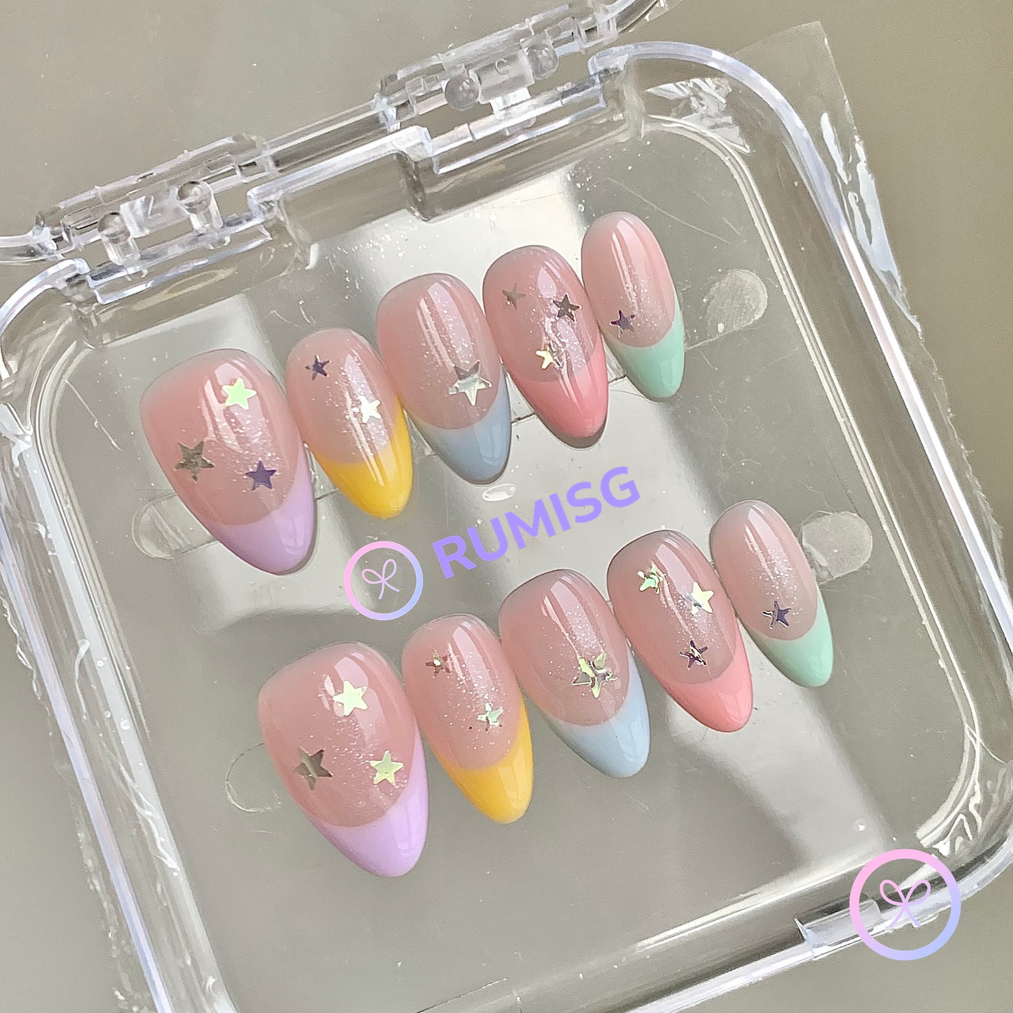 pastelcore nude glossy short almond press on nails with star sticker and pastel french tip