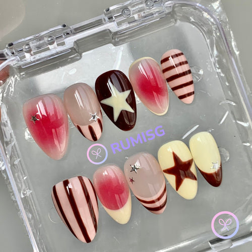 cute nude glossy short almond press on nails with stripes and star motifs