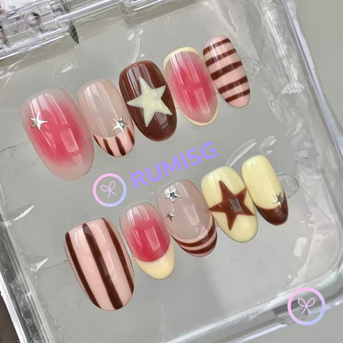 cute nude glossy short oval press on nails with stripes and star motifs