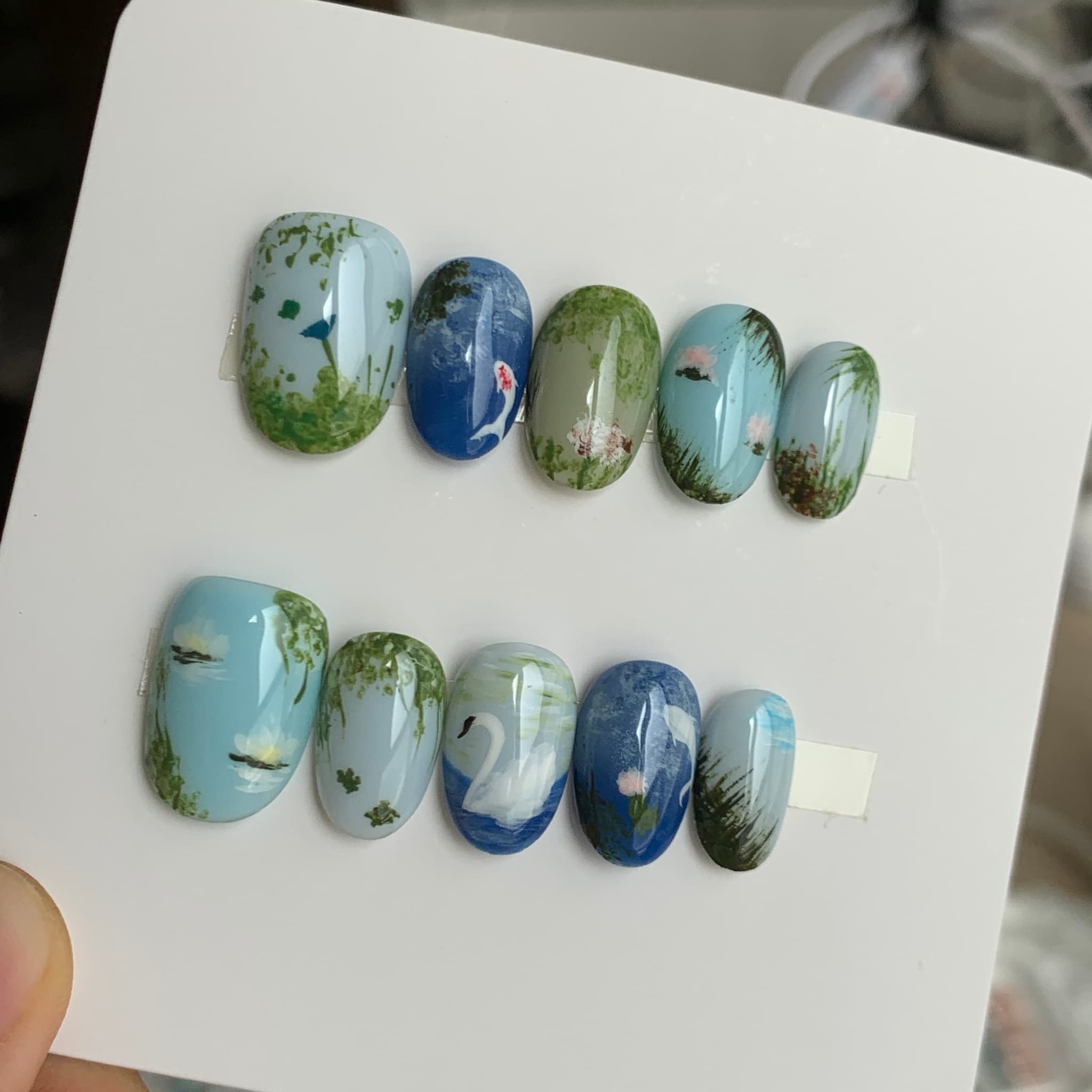 cottagecore blue glossy short round press on nails with swan and koi motifs