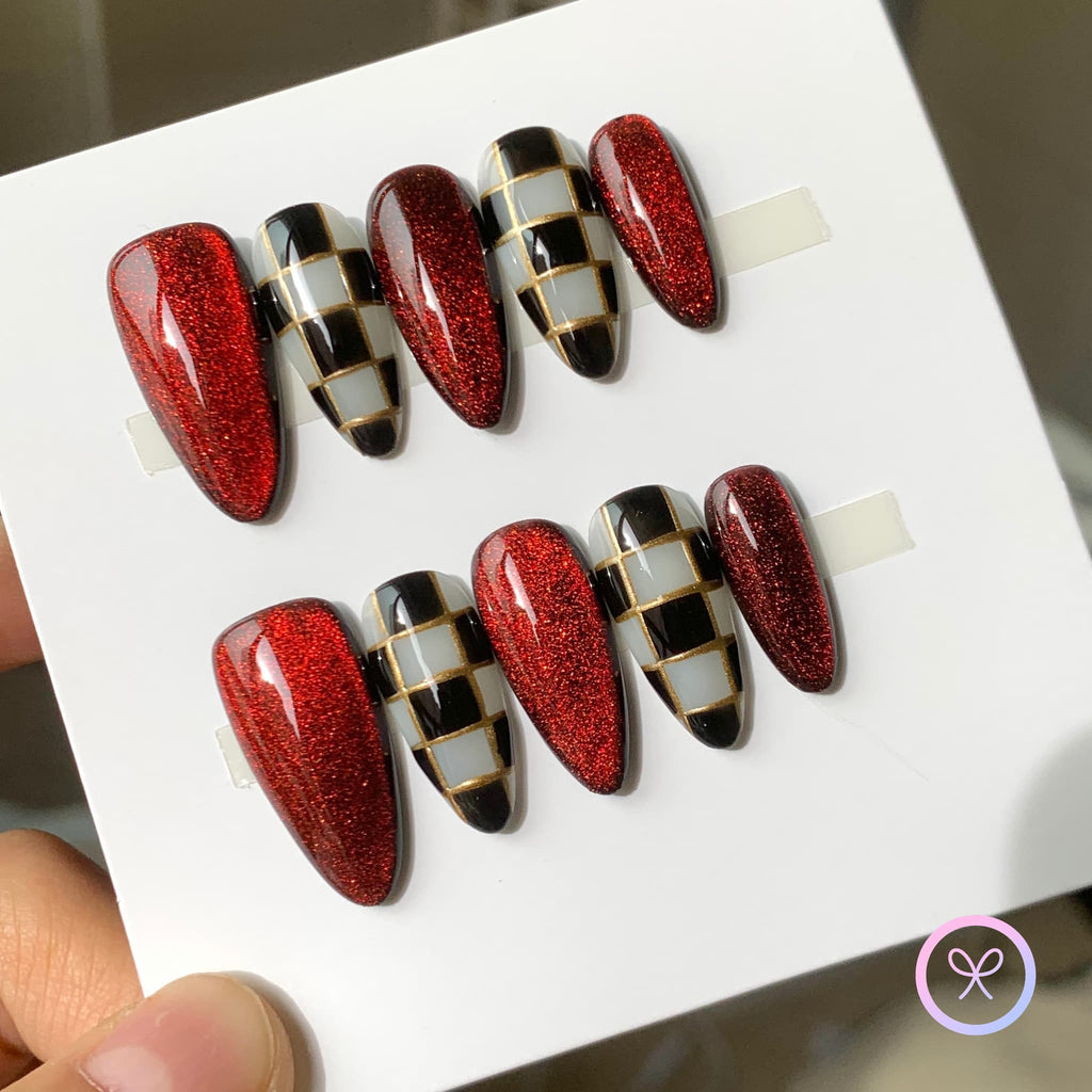 royalcore red glossy medium almond press on nails with checkerboard design
