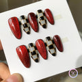 royalcore red glossy medium almond press on nails with checkerboard design