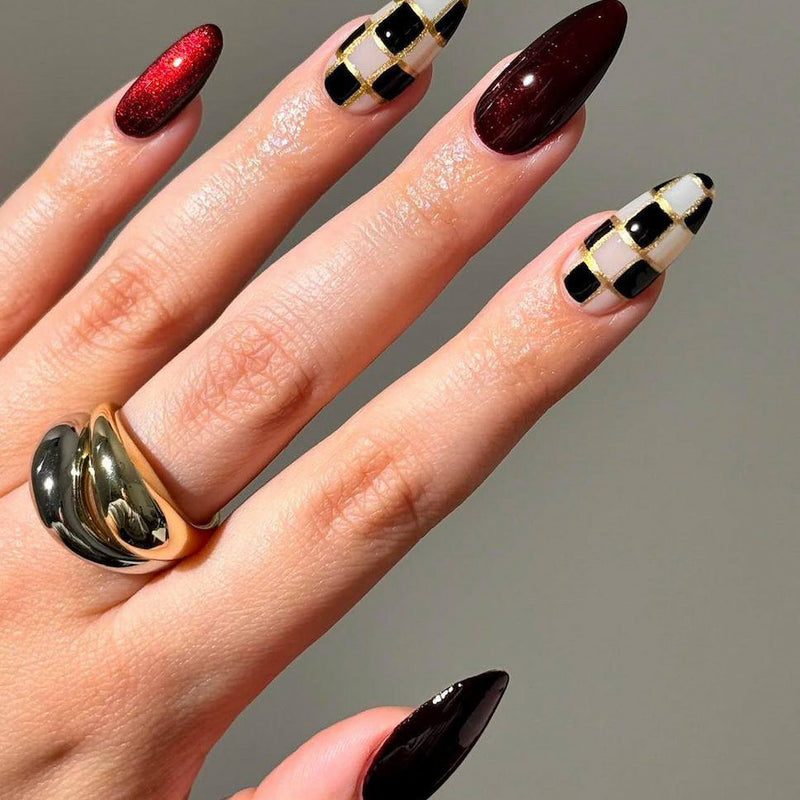 royalcore red glossy medium almond press on nails with checkerboard design