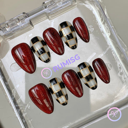 royalcore red glossy short almond press on nails with checkerboard and gold lines