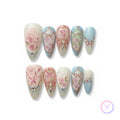 rococo pink glossy medium almond press on nails with gilded bows and roses