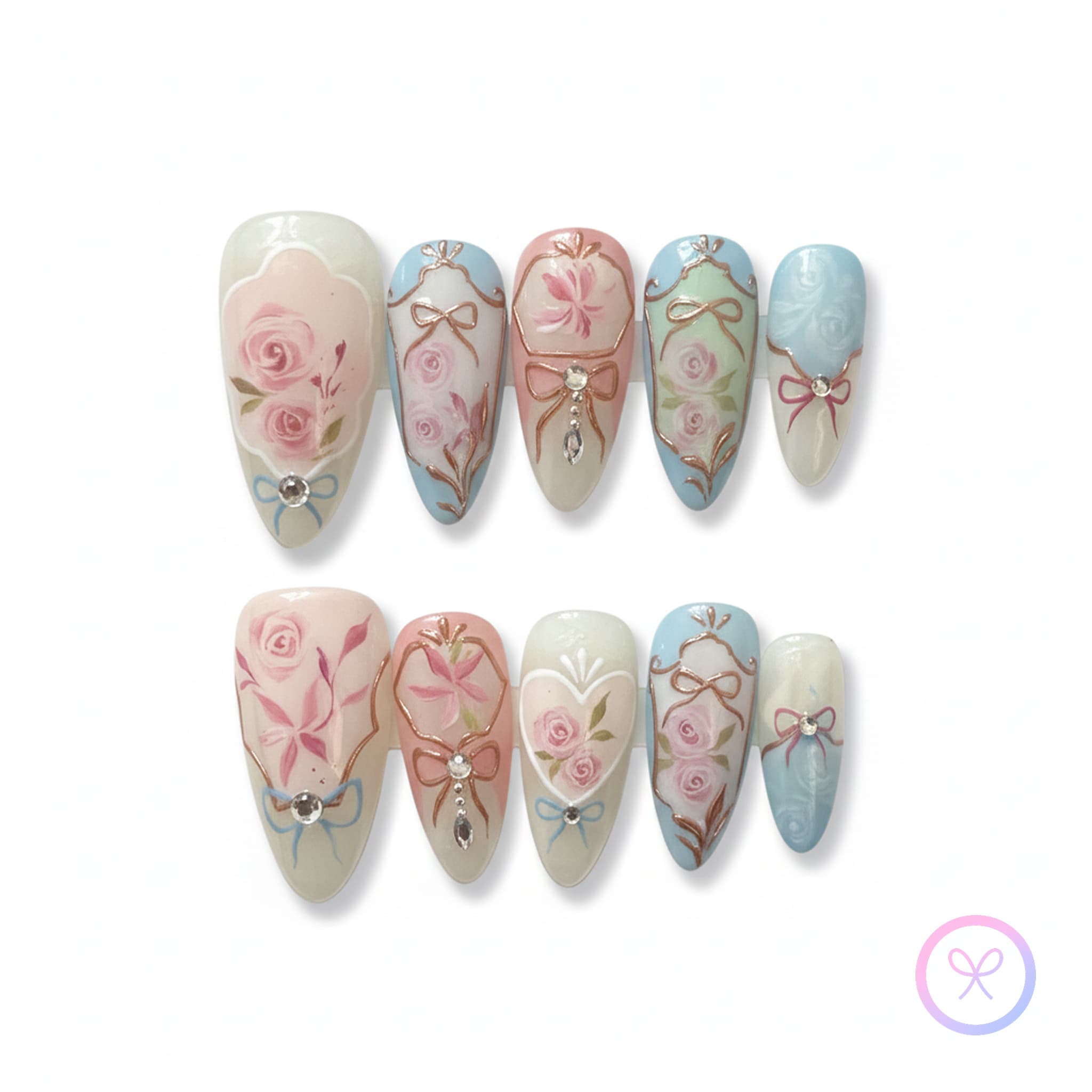 rococo pink glossy medium almond press on nails with gilded bows and roses