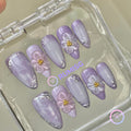elegant purple glossy medium almond press on nails with 3D flower and silver filigree frame