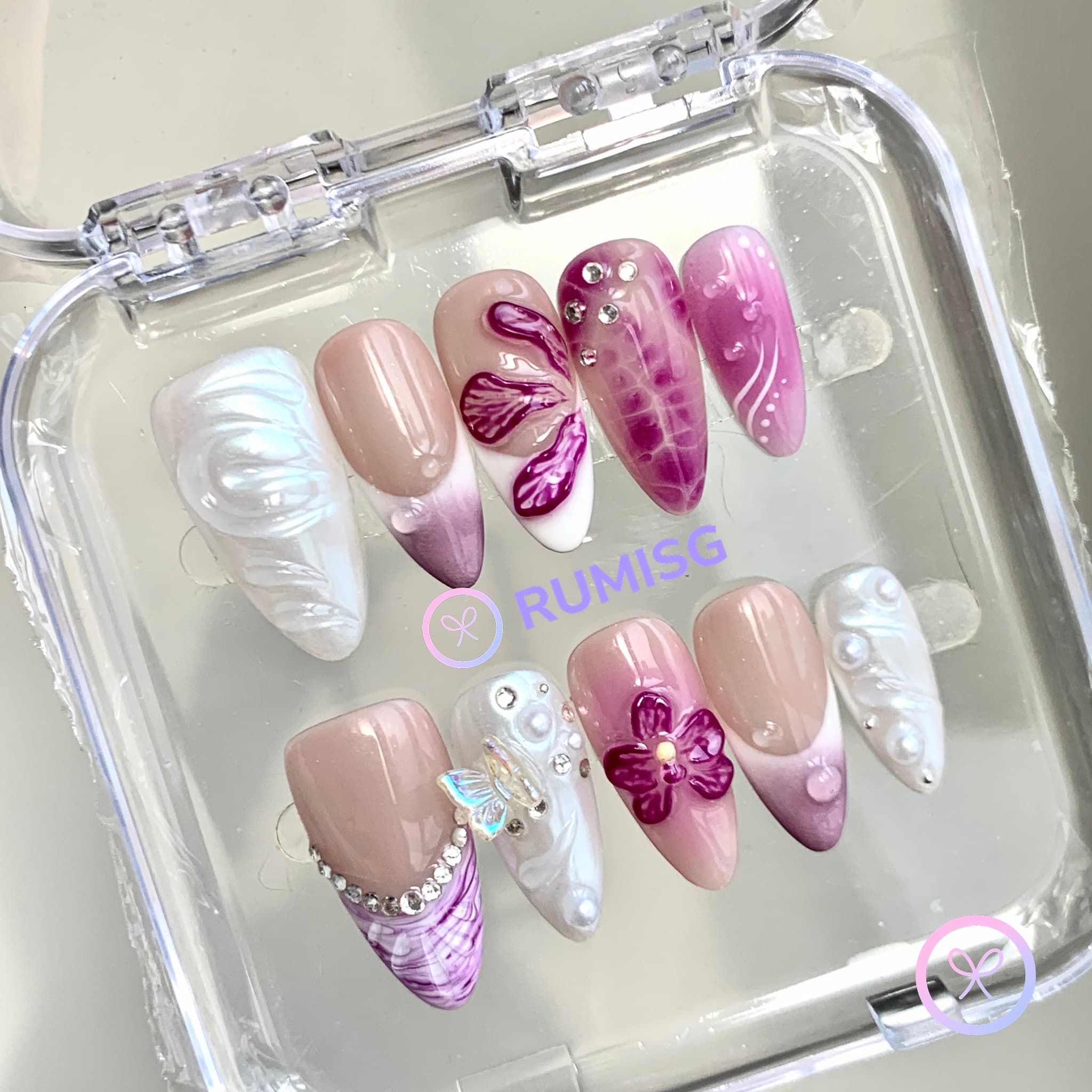 pearlcore purple glossy medium almond press on nails with butterfly charm and orchid flowers