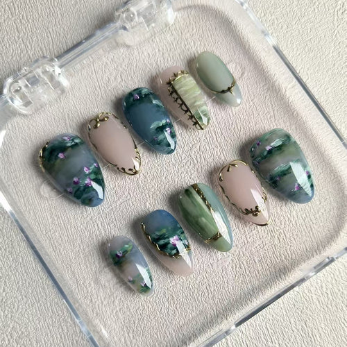 natural blue glossy short almond press on nails with water lilies motifs , oil paint nails with filigree