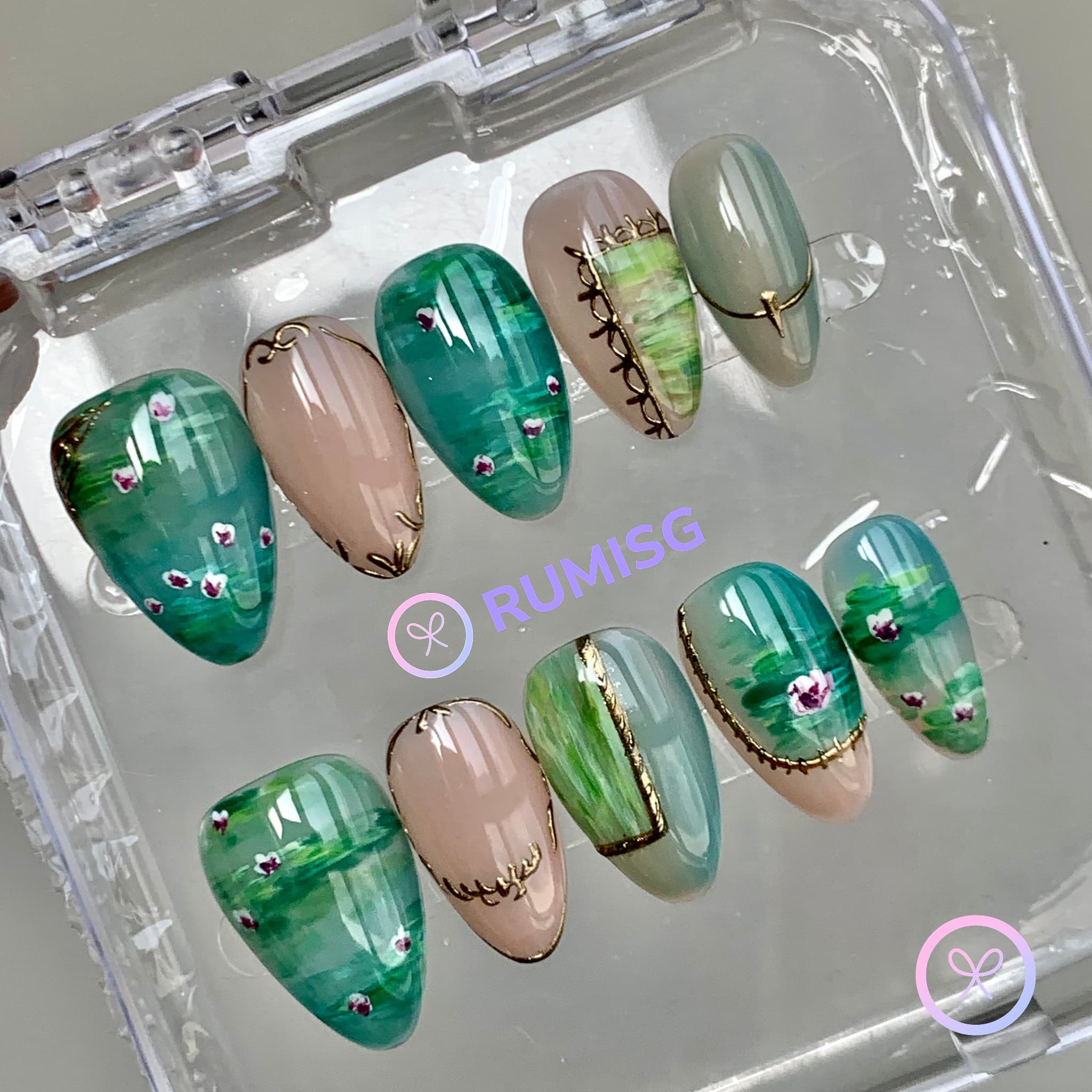 natural green glossy short almond press on nails with bloom flower and gold filigree