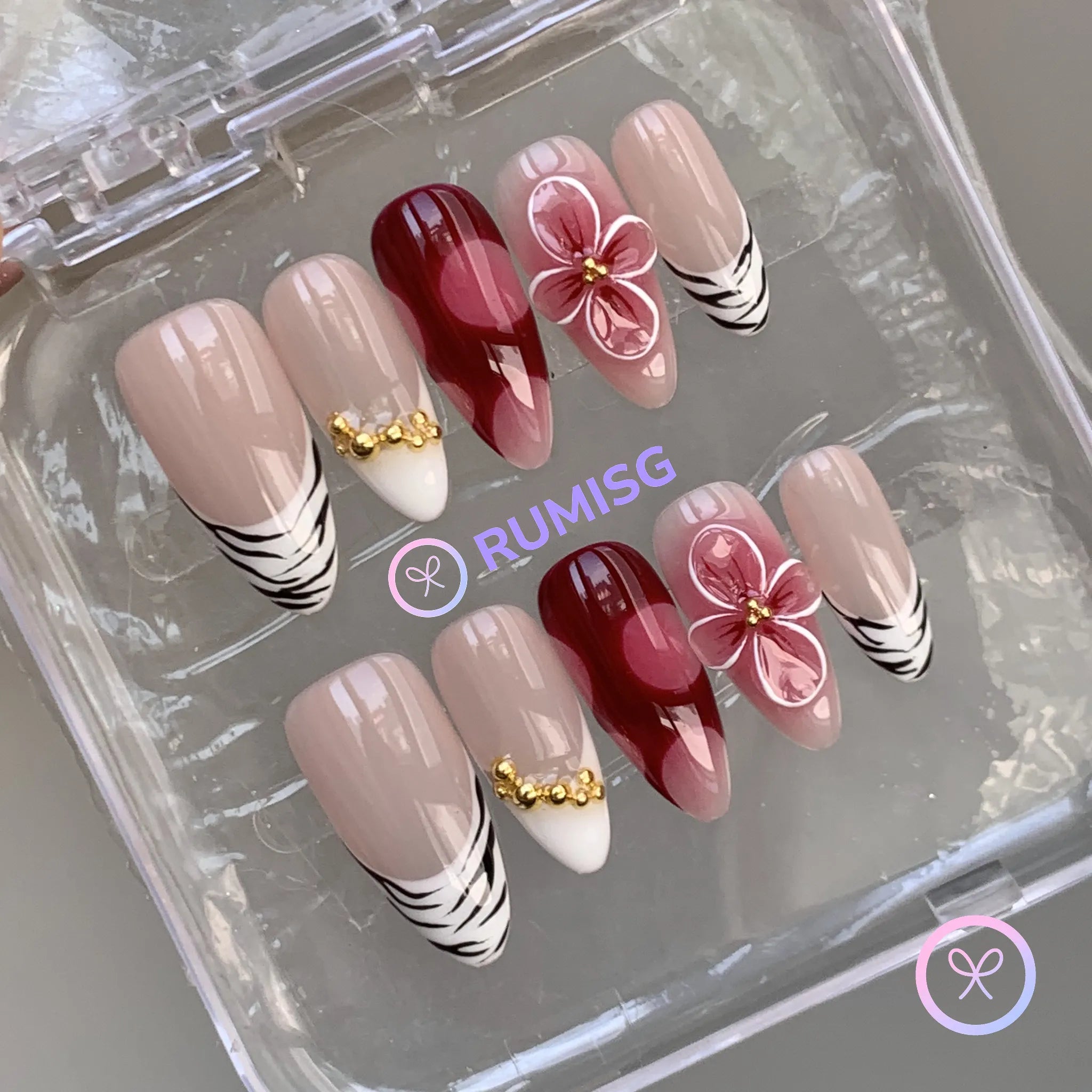 animal print red glossy medium almond press on nails with zebra print and 3D flower