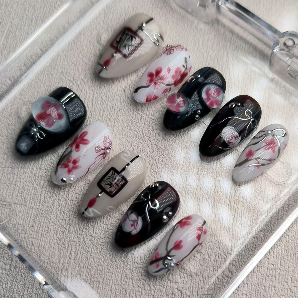 elegant black glossy short almond press on nails with sakura motifs and ink aesthetic
