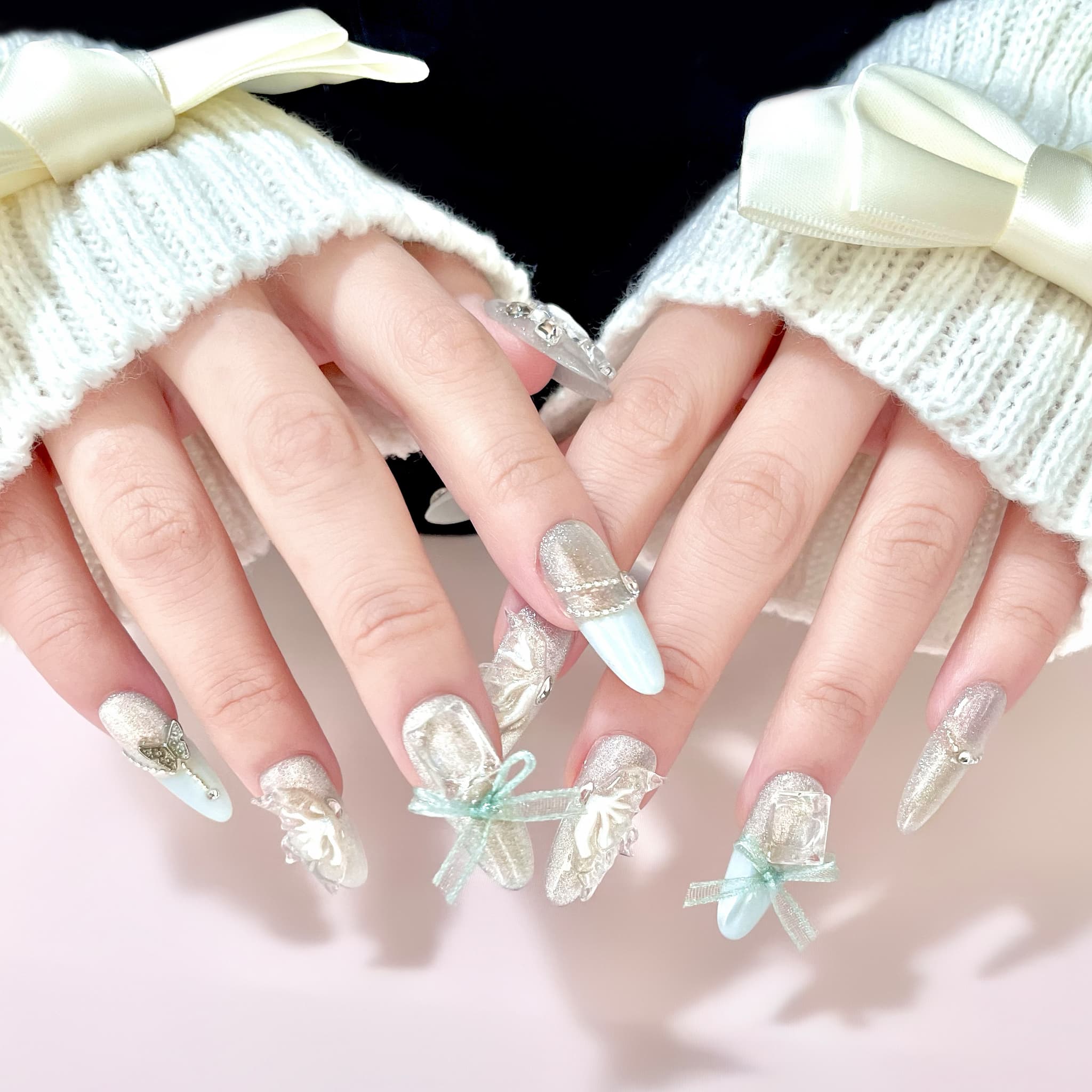 long length pale turquoise oval press on nails with butterfly wings design
