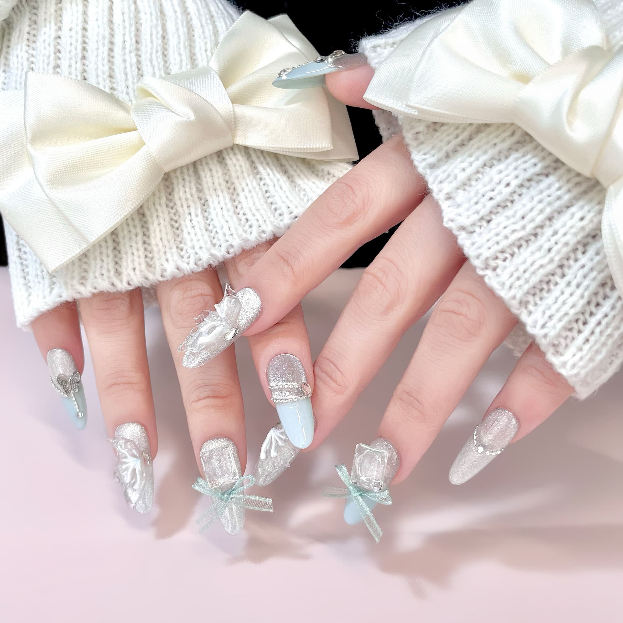long length pale turquoise oval press on nails with butterfly wings design