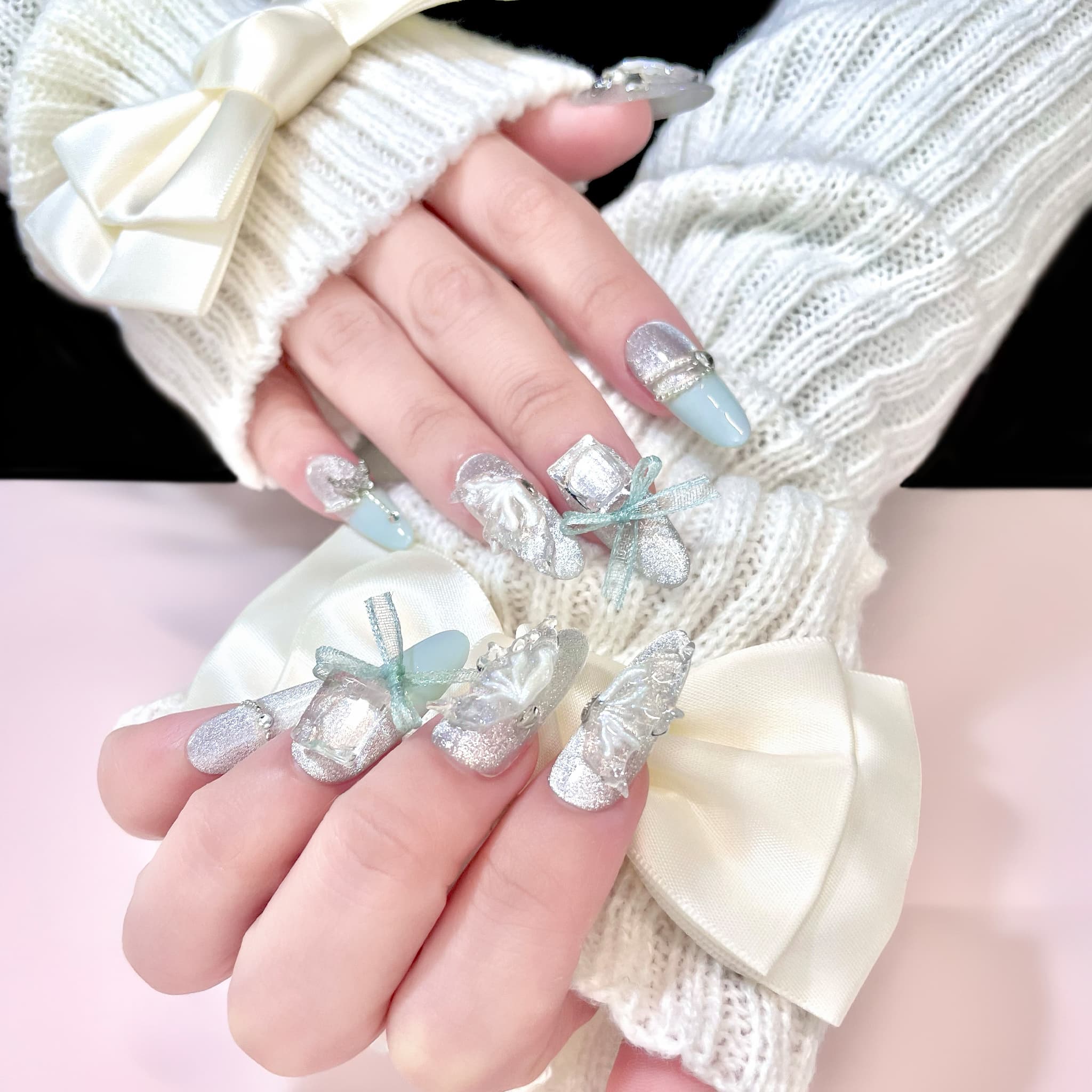 long length pale turquoise oval press on nails with butterfly wings design