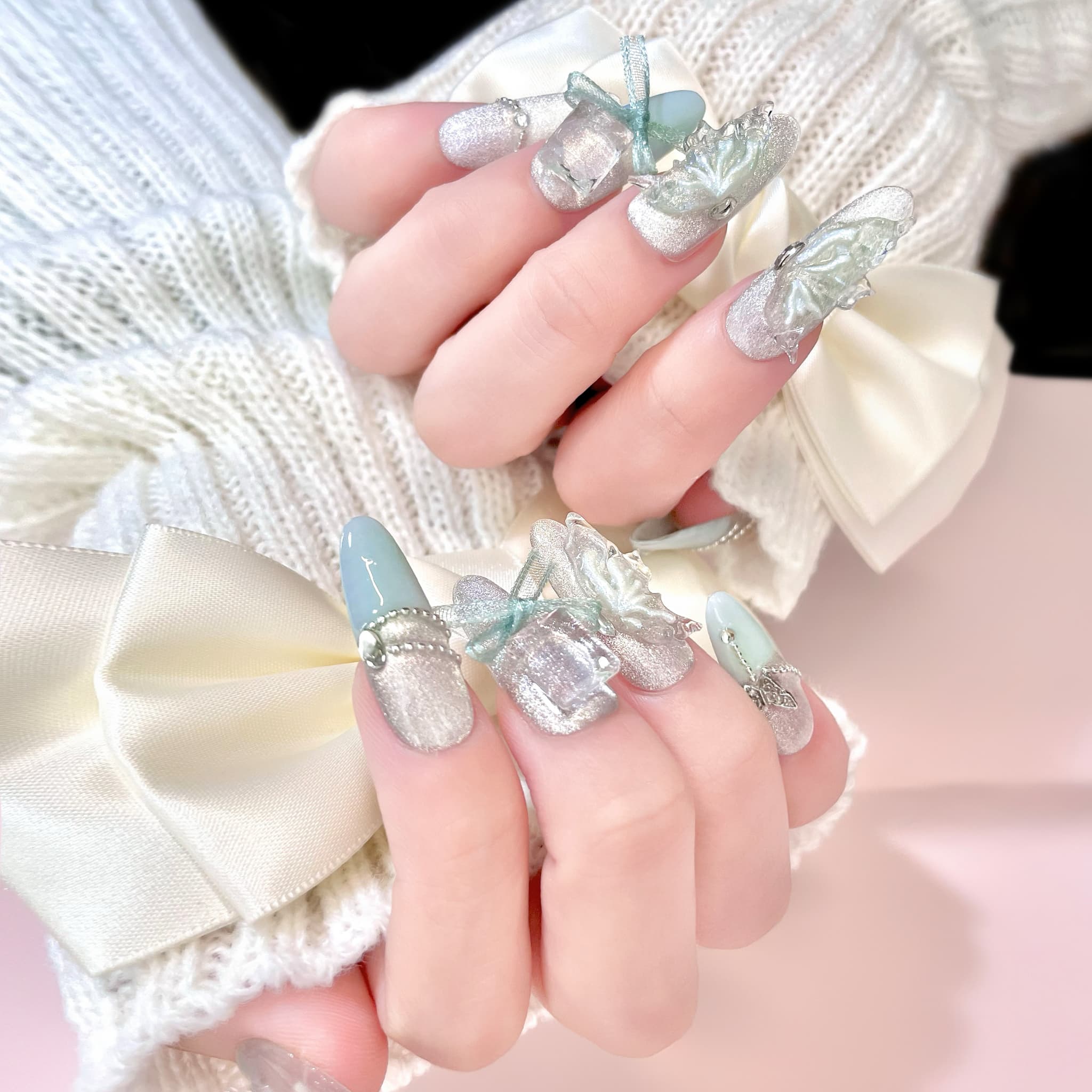 long length pale turquoise oval press on nails with butterfly wings design