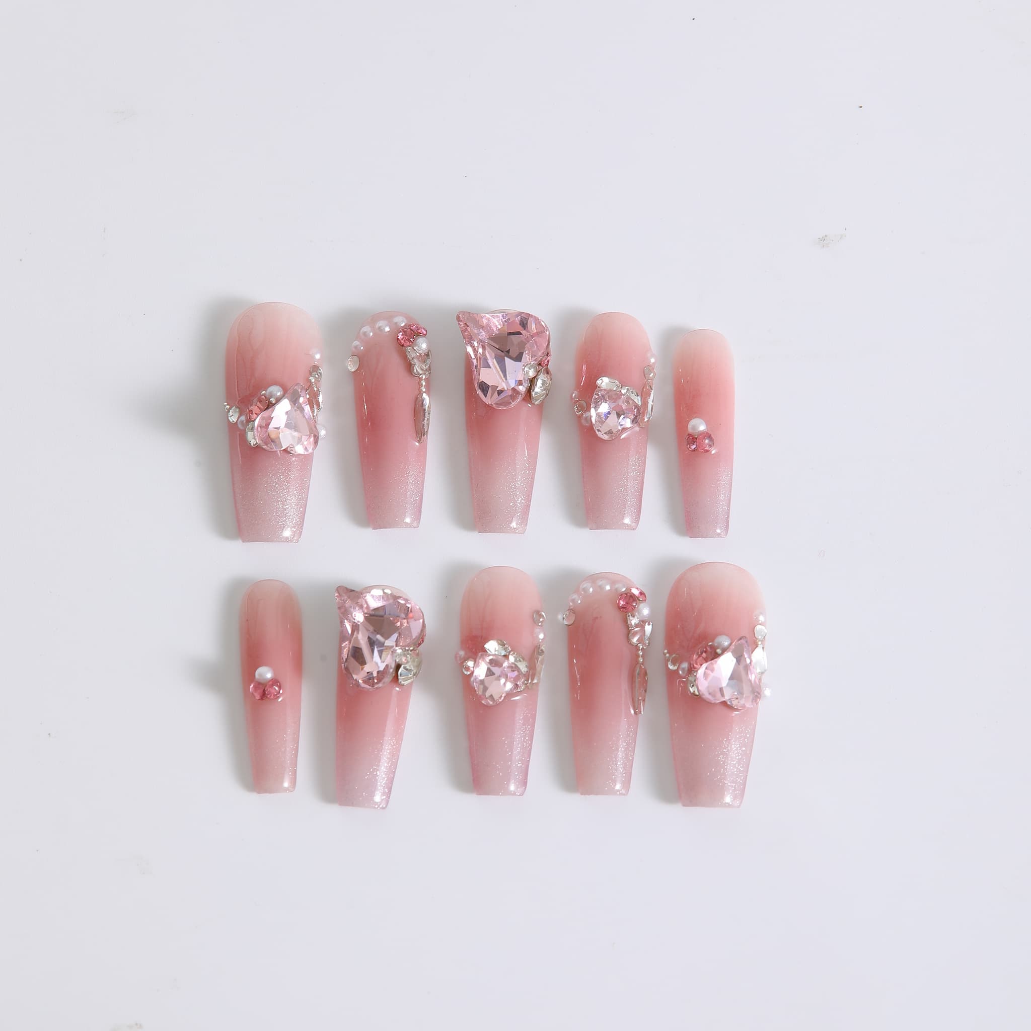 long length light pink coffin press on nails with gemstones