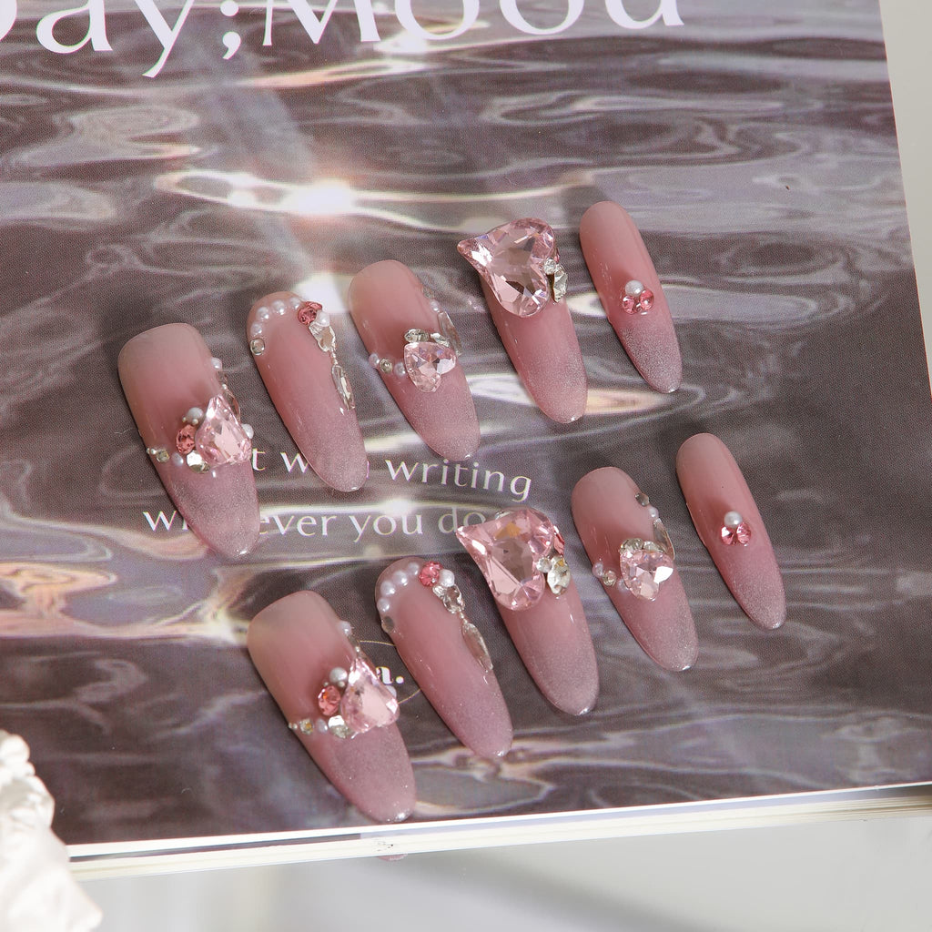 long length light pink oval press on nails with gemstones
