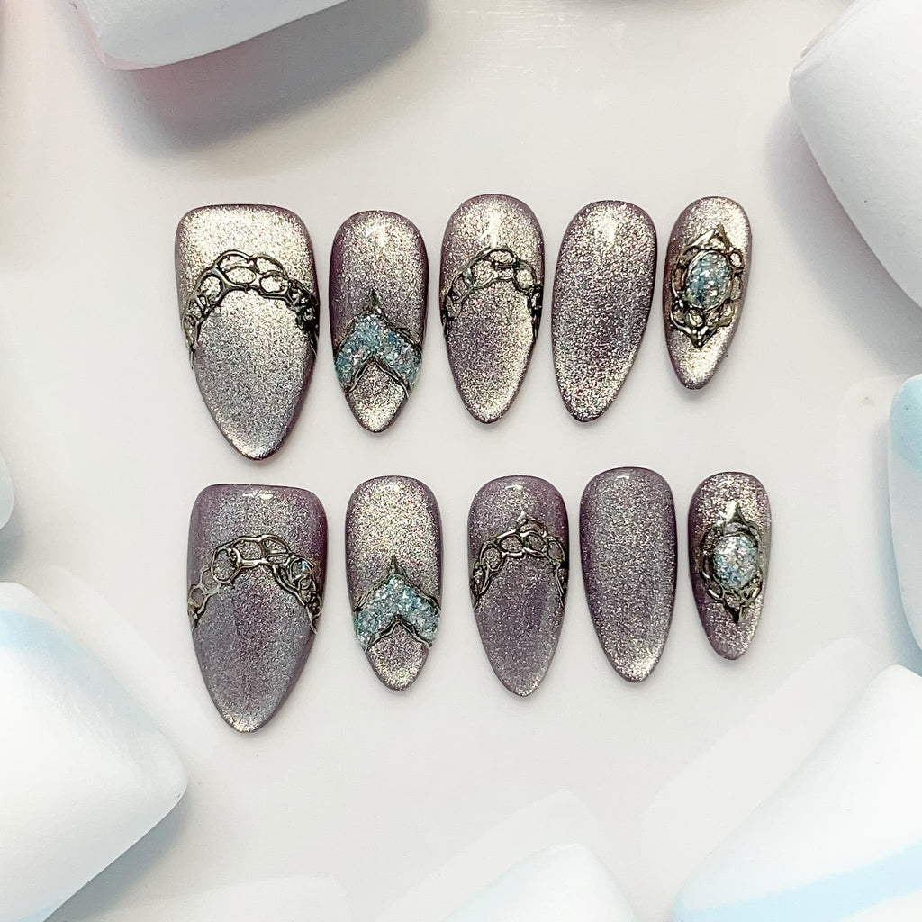 medium length lavender almond press on nails with glitter design