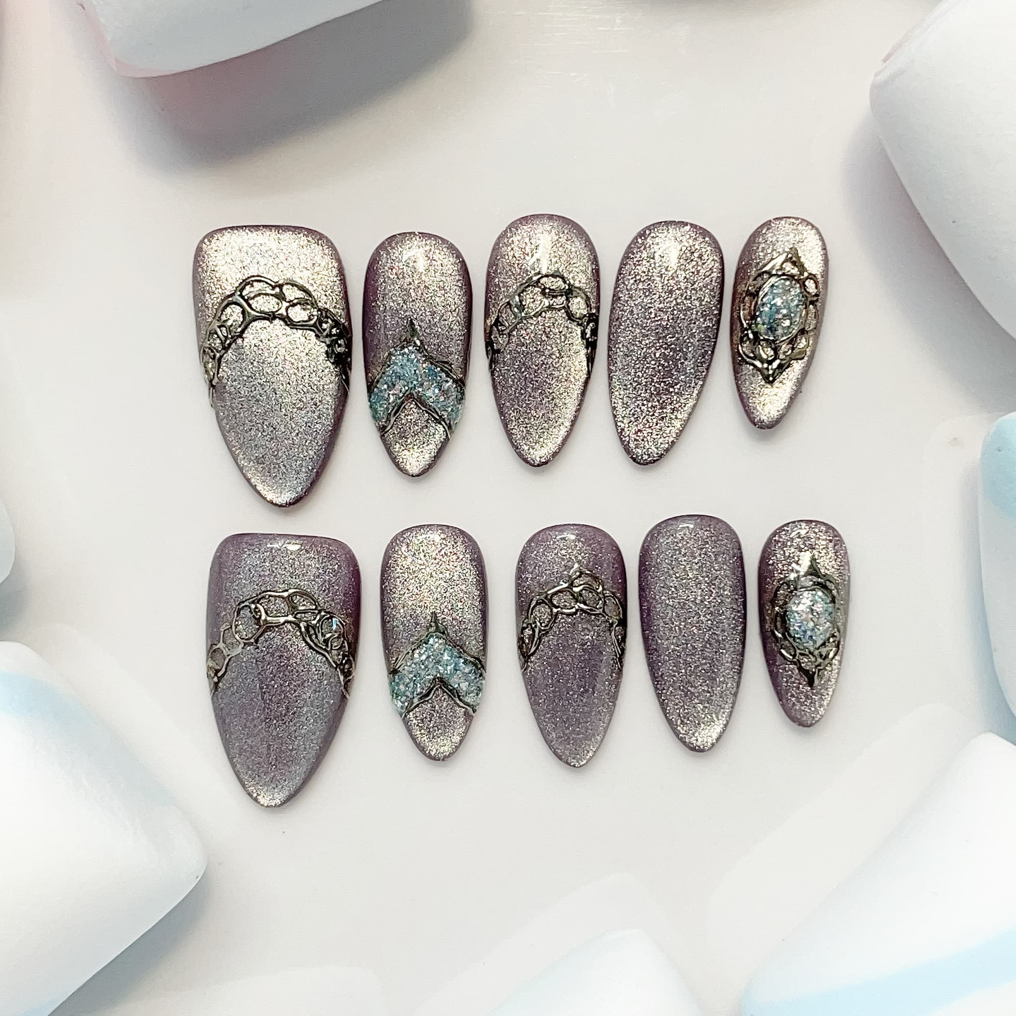 medium length lavender almond press on nails with glitter design