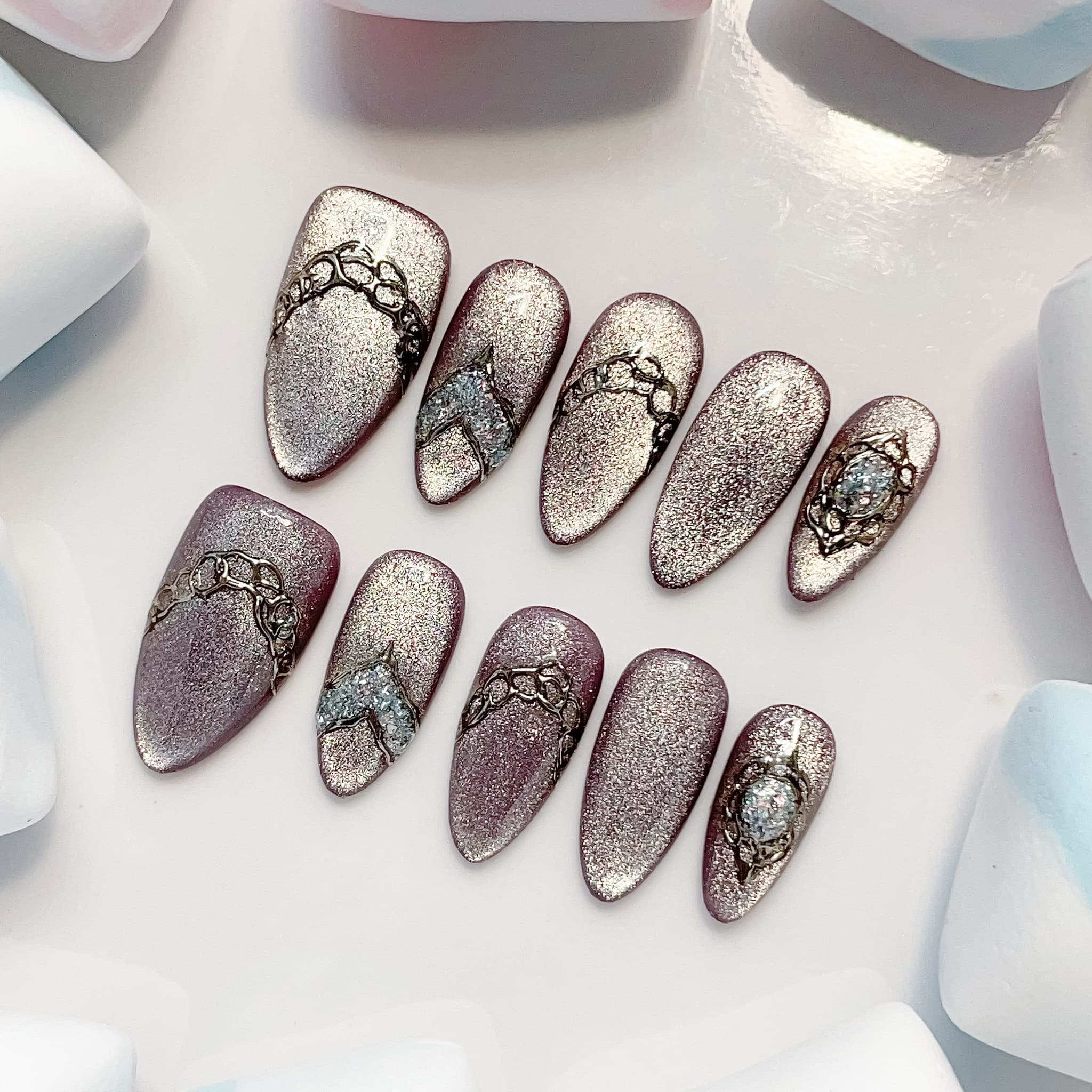 medium length lavender almond press on nails with glitter design
