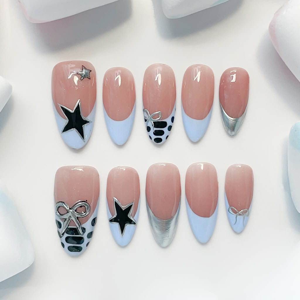 medium length skyblue almond press on nails , french tips design