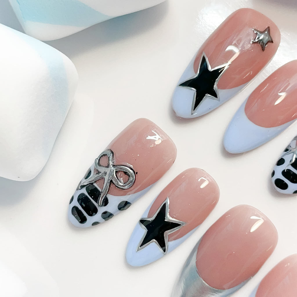 medium length skyblue almond press on nails , french tips design