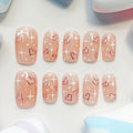 medium length peach puff square press on nails with star and heart shape patterns