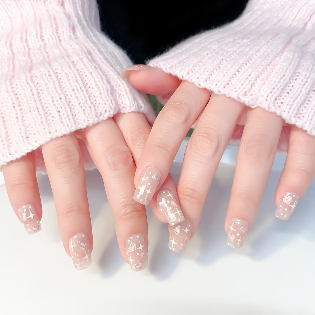 medium length peach puff square press on nails with star and heart shape patterns