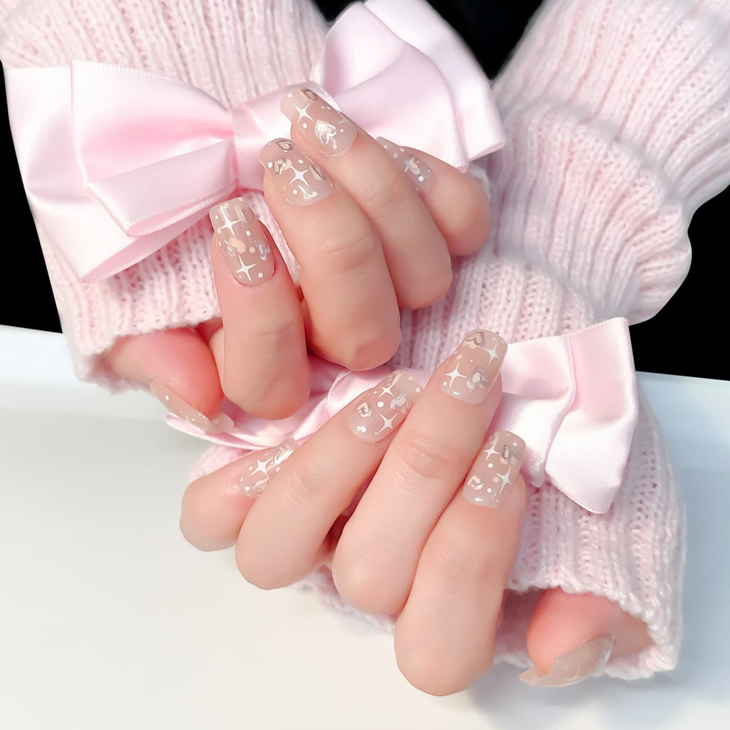 medium length peach puff square press on nails with star and heart shape patterns