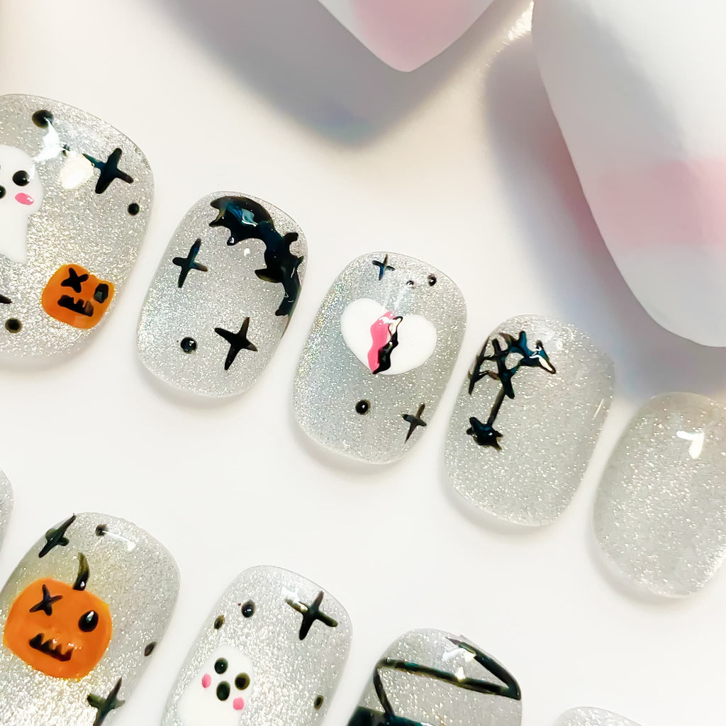 short length silver squoval press on nails with halloween design