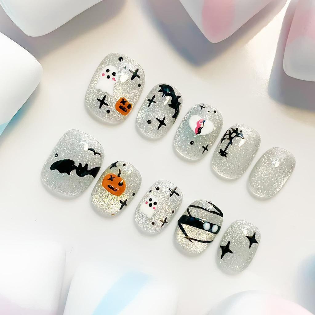 short length silver squoval press on nails with halloween design