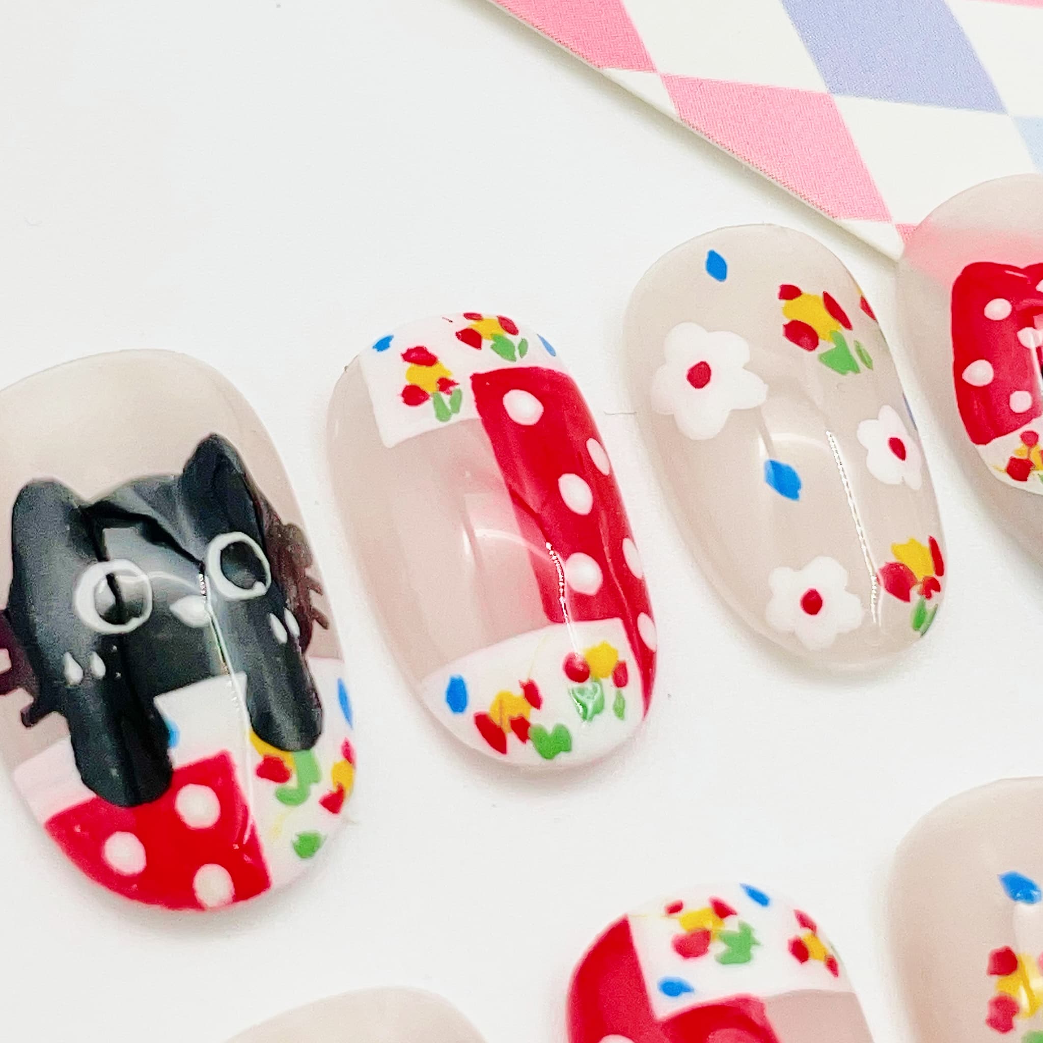 short length red oval press on nails with cat design, spring season theme design