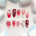 medium length crimson oval press on nails with spiral/star and cherries design