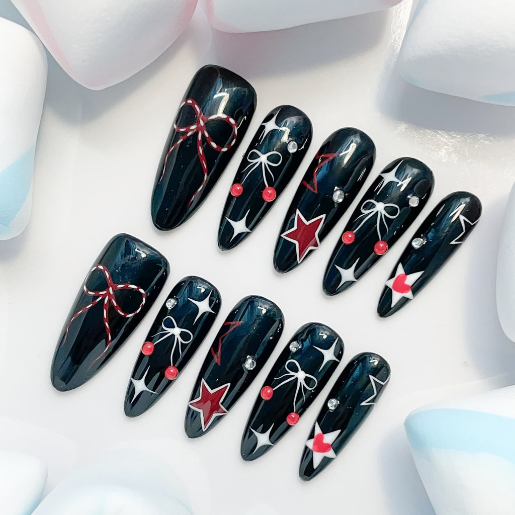long length black oval press on nails with bow design