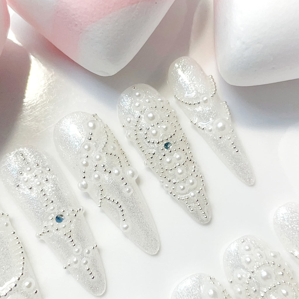 long length white stiletto press on nails with pearl design