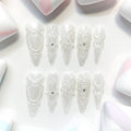 long length white stiletto press on nails with pearl design