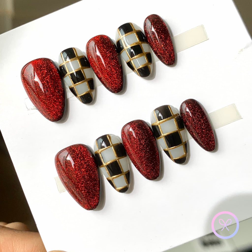 royalcore red glossy short almond press on nails with checkerboard design