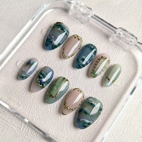natural blue glossy short almond press on nails with water lilies motifs , oil paint nails with filigree