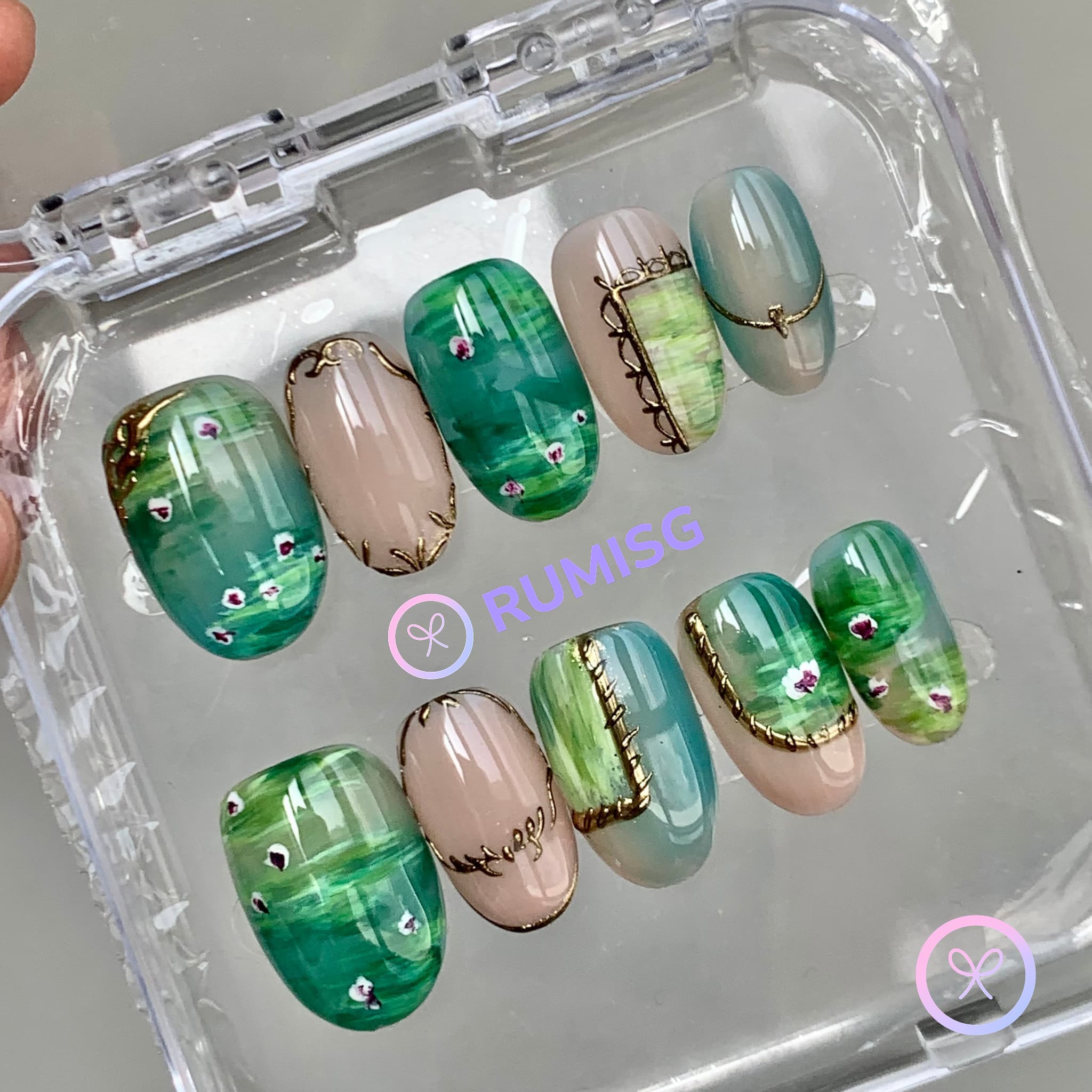 natural green glossy short oval press on nails with bloom flower and gold filigree