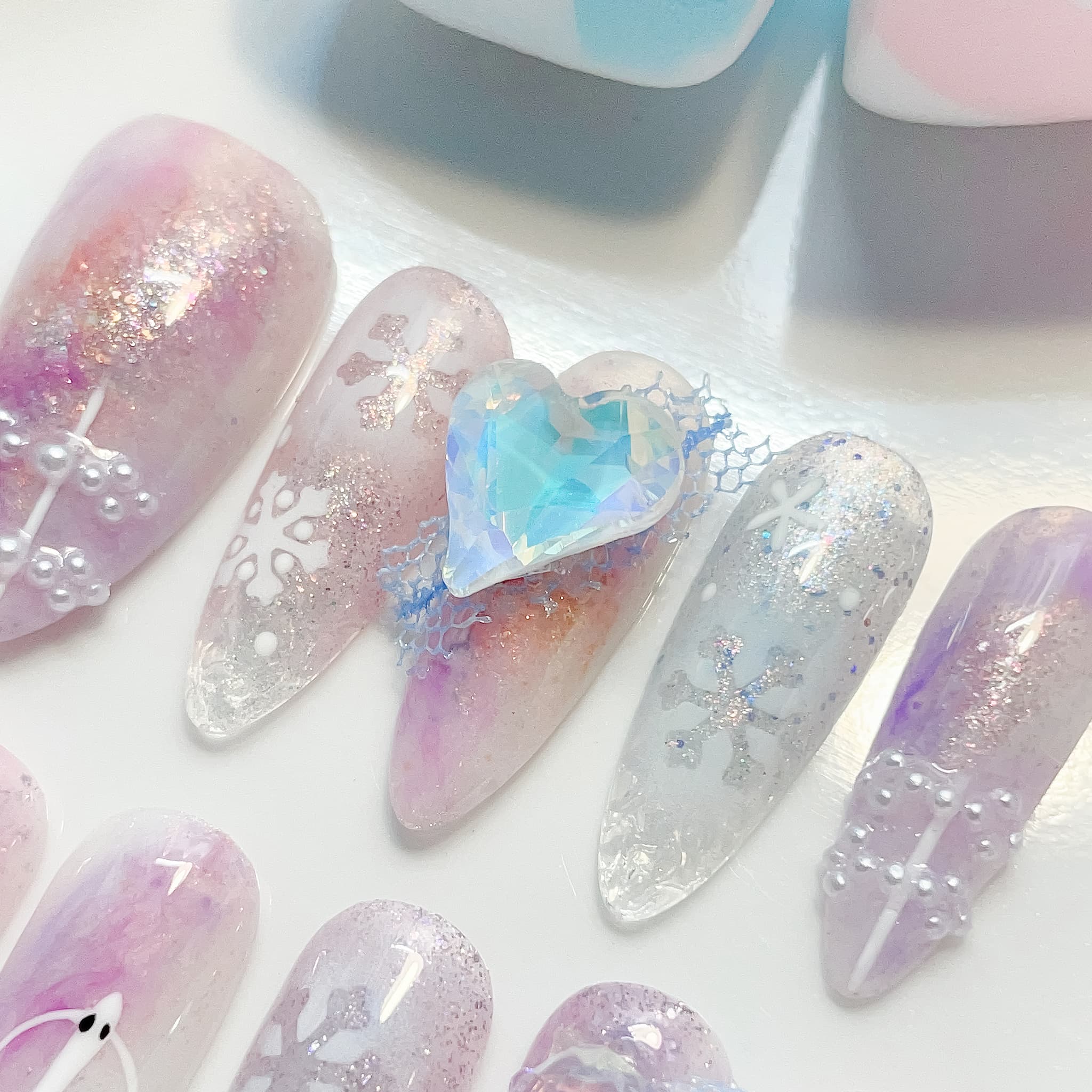 long length lavender almond press on nails with snowflakes design