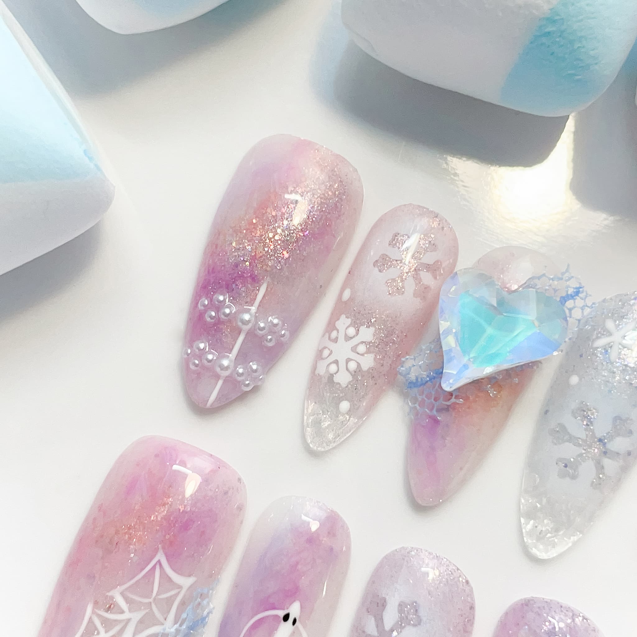 long length lavender almond press on nails with snowflakes design