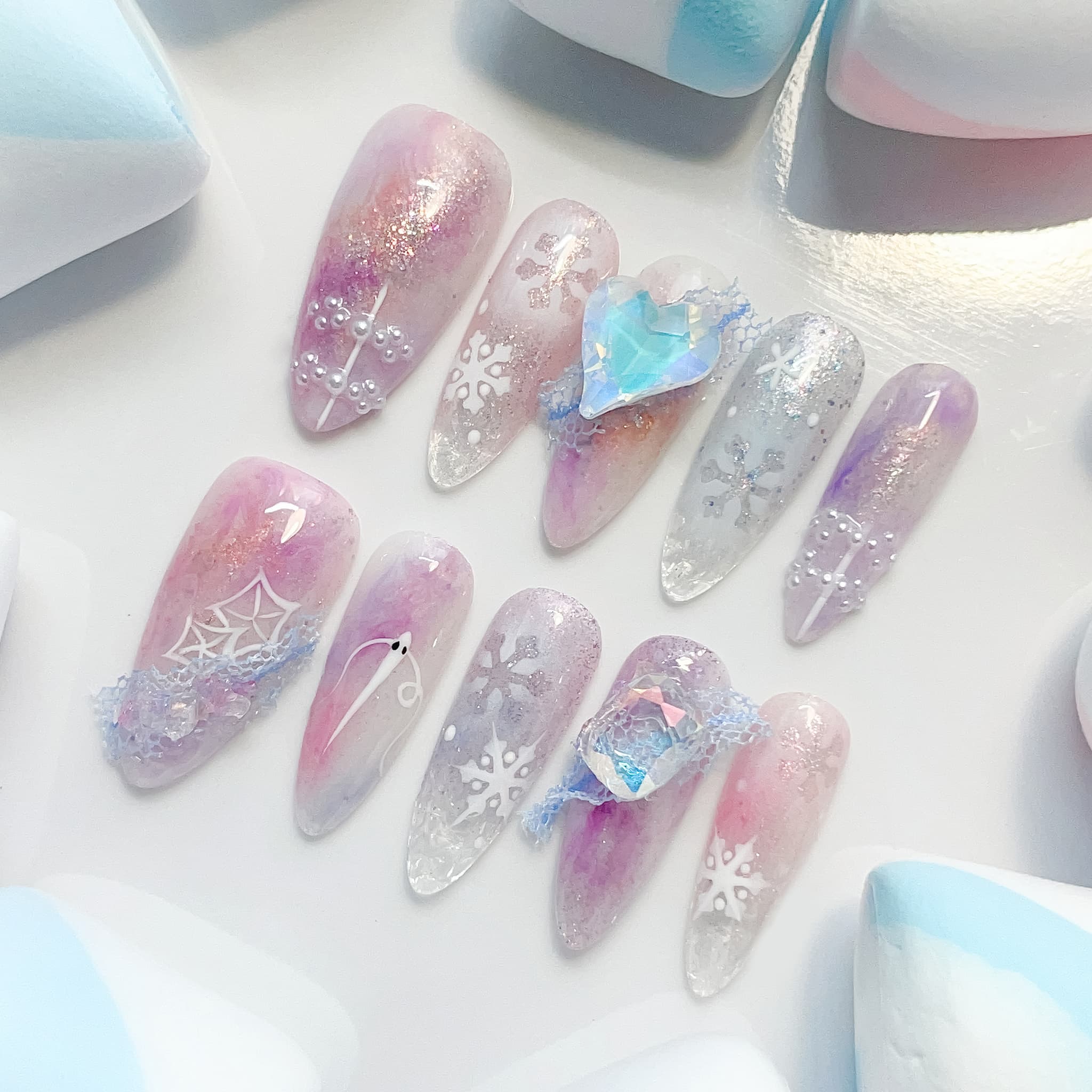 long length lavender almond press on nails with snowflakes design