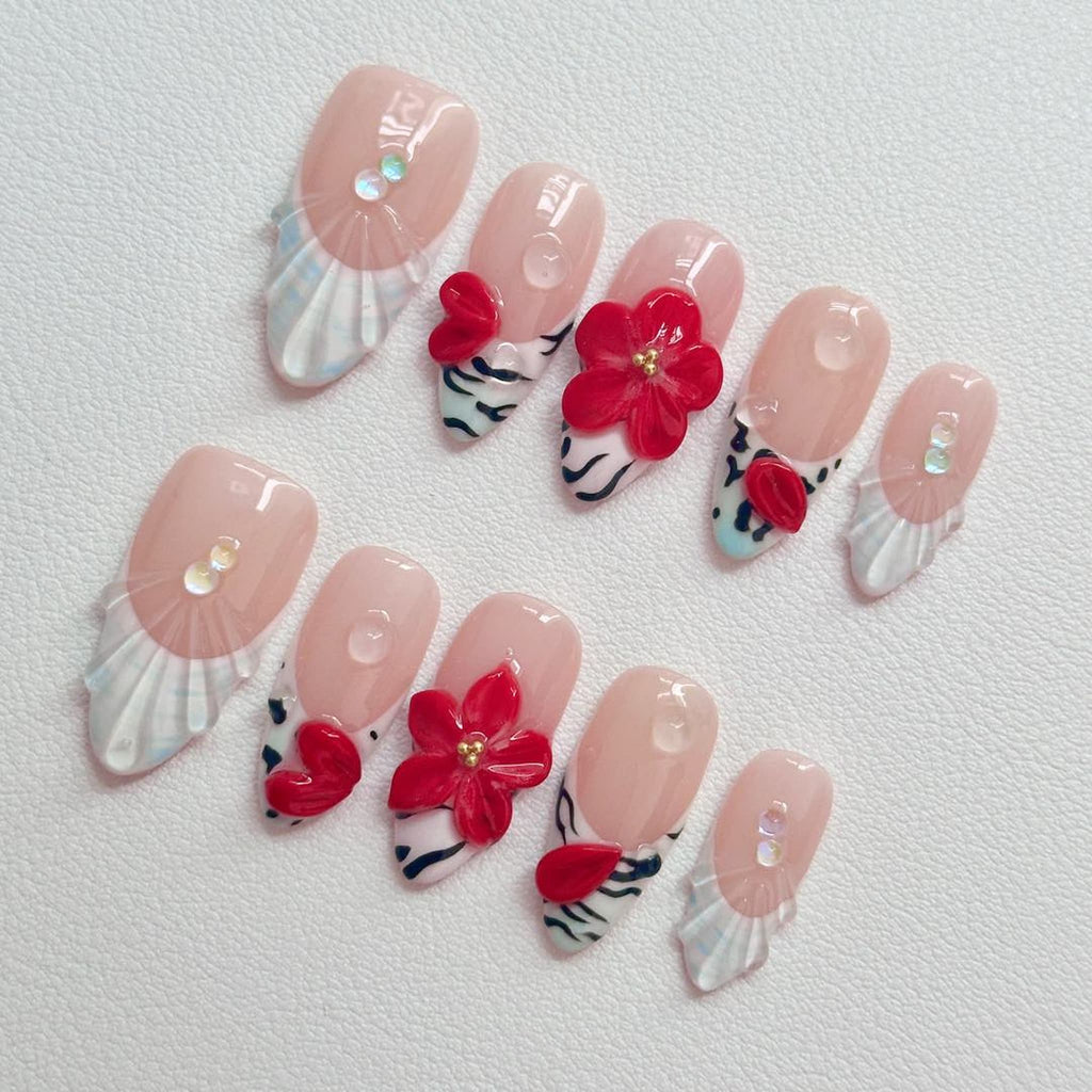 medium length white almond press on nails with zebra print designs and red flowers